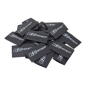 Pile of black RX Discharger branded heat shrink tubing sleeves for electrical wire insulation and protection