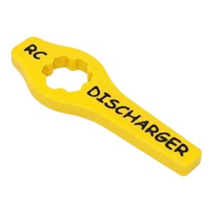 Yellow plastic PC discharger tool with center hole, labeled “PC DISCHARGER” on white background
