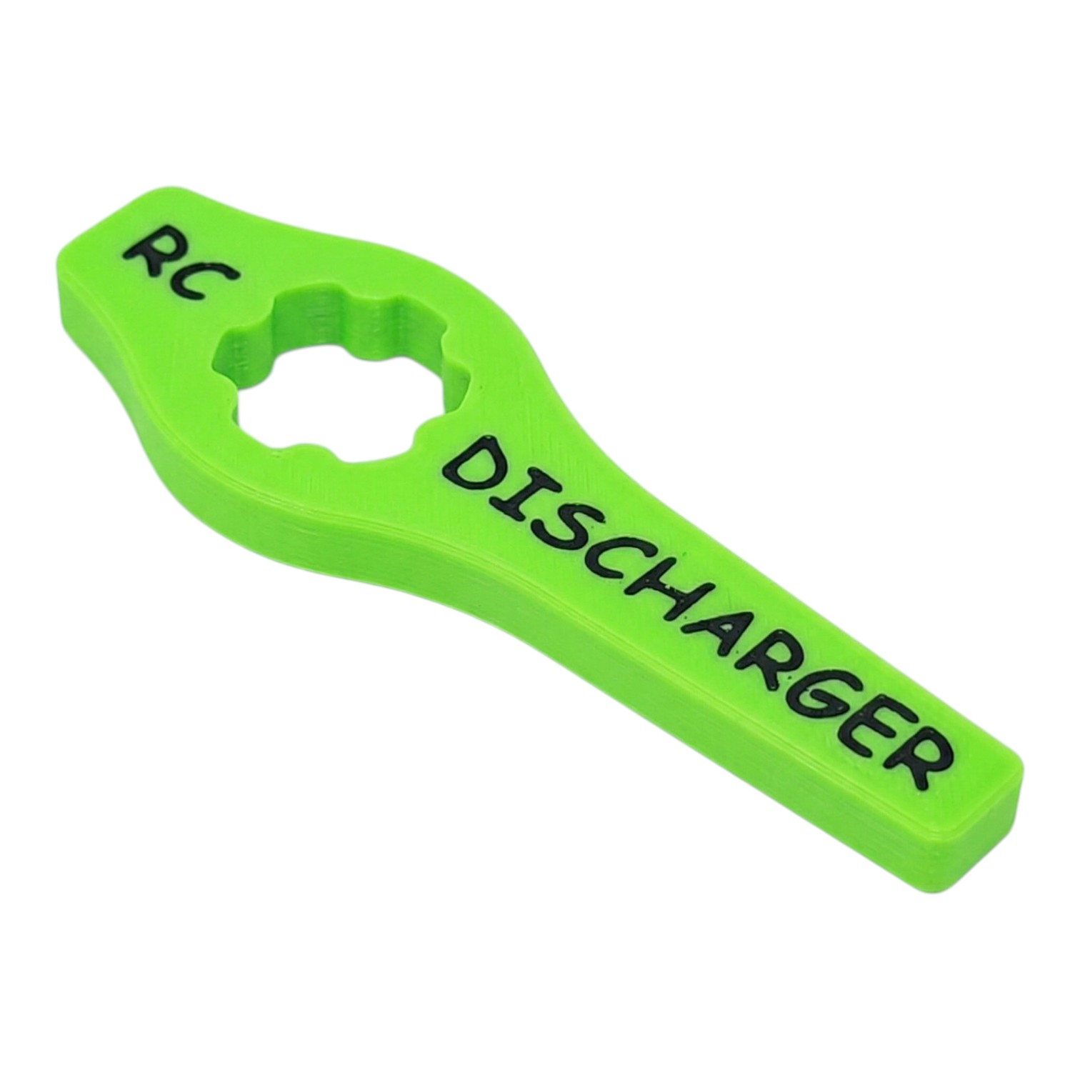 Green 3D-printed RC discharger tool with “RC DISCHARGER” text and star-shaped center cutout on white background
